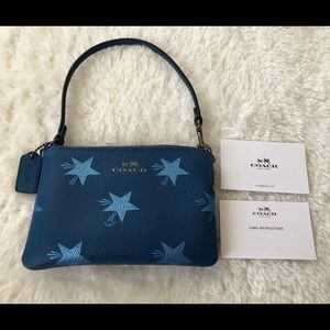Coach wristlet with stars